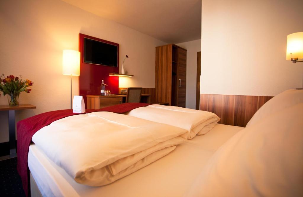 Hotel Knaus Am Hafen ウールディンゲン・ミュールホーフェン 部屋 写真
